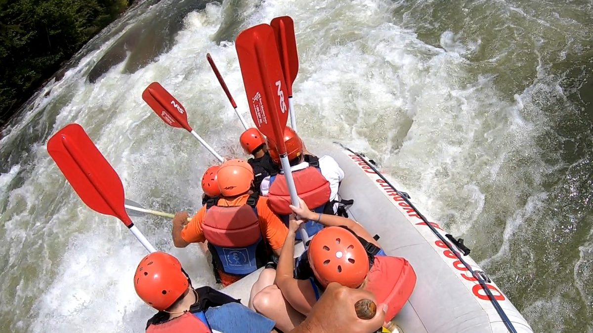 Ocoee River rafting adventure with three generations taking time to play and surf